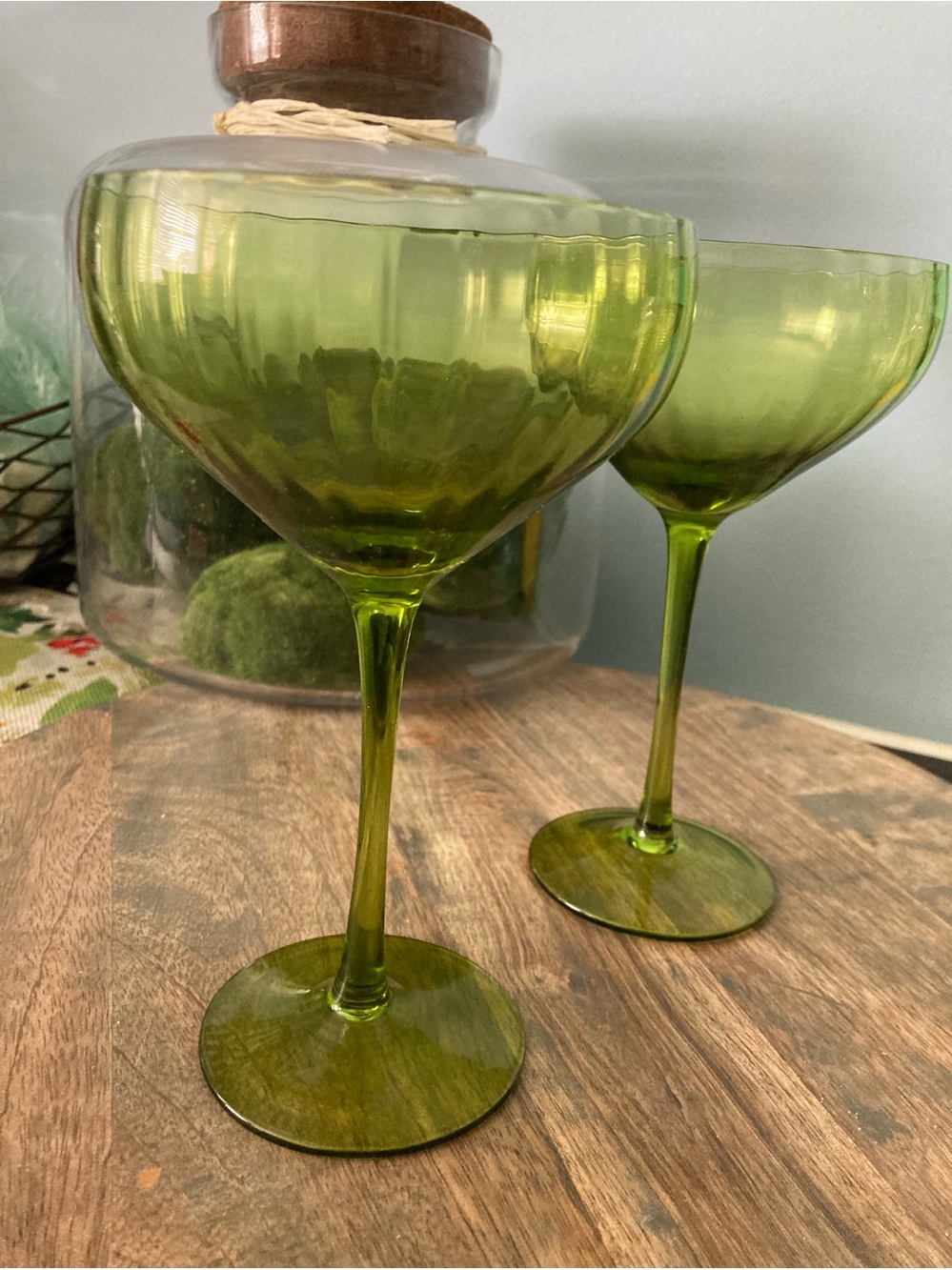 MCM Vintage green glass coupe featuring a slender stem & bowl
Set Barware